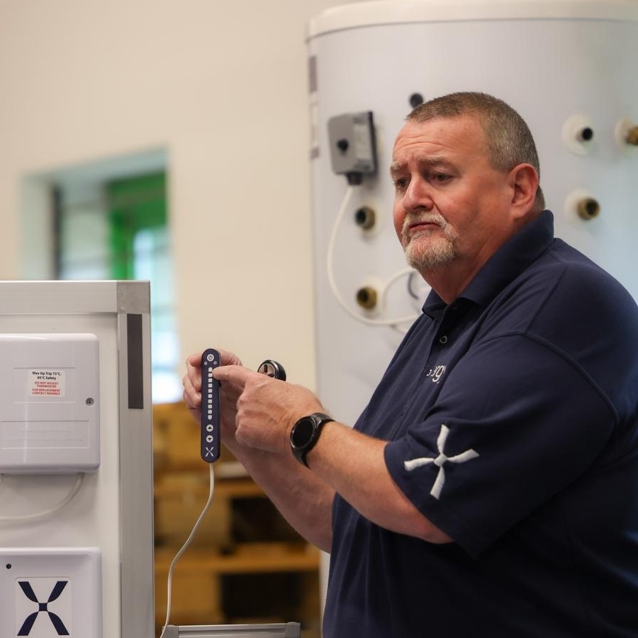 Roy Fugler, Mixergy Training Officer, provides in-person training.